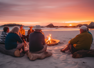 Singles Travel Tours Over 35: How to Find Your Perfect Adventure Single Travel Tours Over 35, a group of mature travelers gathered around a campfire on a secluded beach