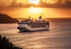 Age No Bar: Why Cruising is Everyone’s Voyage of Discovery luxury cruise caribbean, a large opulent cruise liner sails the turquoise waters,