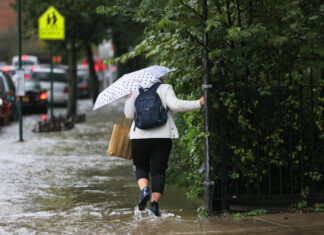 NYC wrings out after record-breaking rainfall swamps the subway, airports and roads