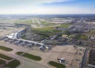 Shuttle Van Crashes Into Airplane in Chicago