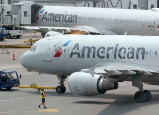 Flight attendant charged with filming young girls in airplane bathroom