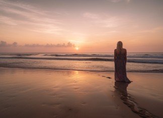 Embracing Solo Travel in Your 40s A mature solo traveler enjoying a scenic sunset view in Bali