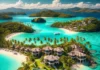 Discover Exclusive Private Islands in the Philippines – Contact Us for Unmatched Deals A stunning private island in the Philippines with turquoise waters, white sandy beaches, lush tropical vegetation, and luxurious beachfront villas under a sunny blue sky