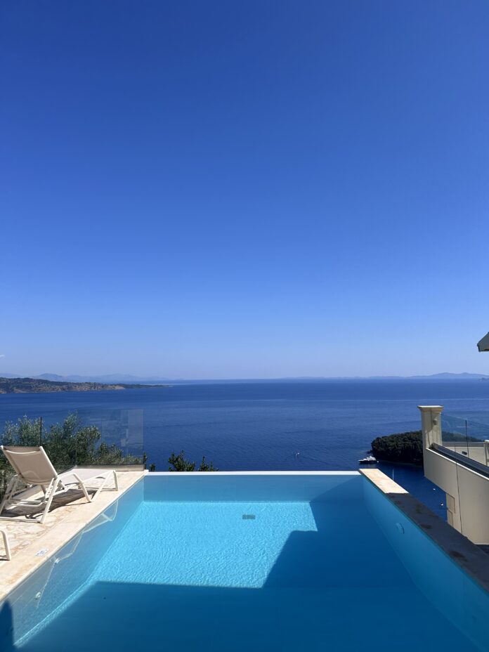 Villa Bliss Corfu infinity pool overlooking Kalami Bay and the Durrells White House Villa Bliss Corfu infinity pool overlooking Kalami Bay and the Durrells White House