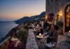 The 10:00 PM Negroni: Why Midlife Solo Travel Makes Strangers So Dangerous Luxury solo travel over 40 at an elegant hotel bar